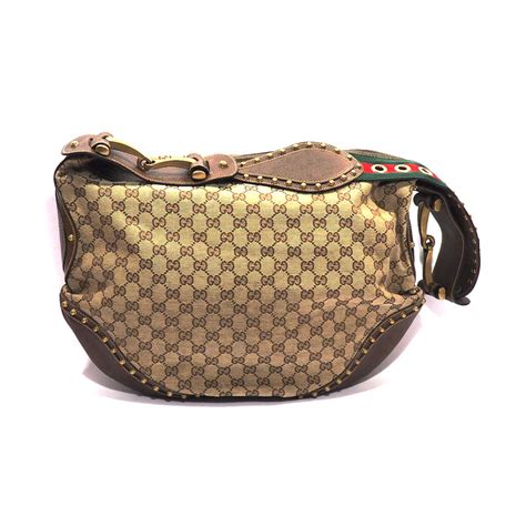 accorciare tracolla borsa gucci